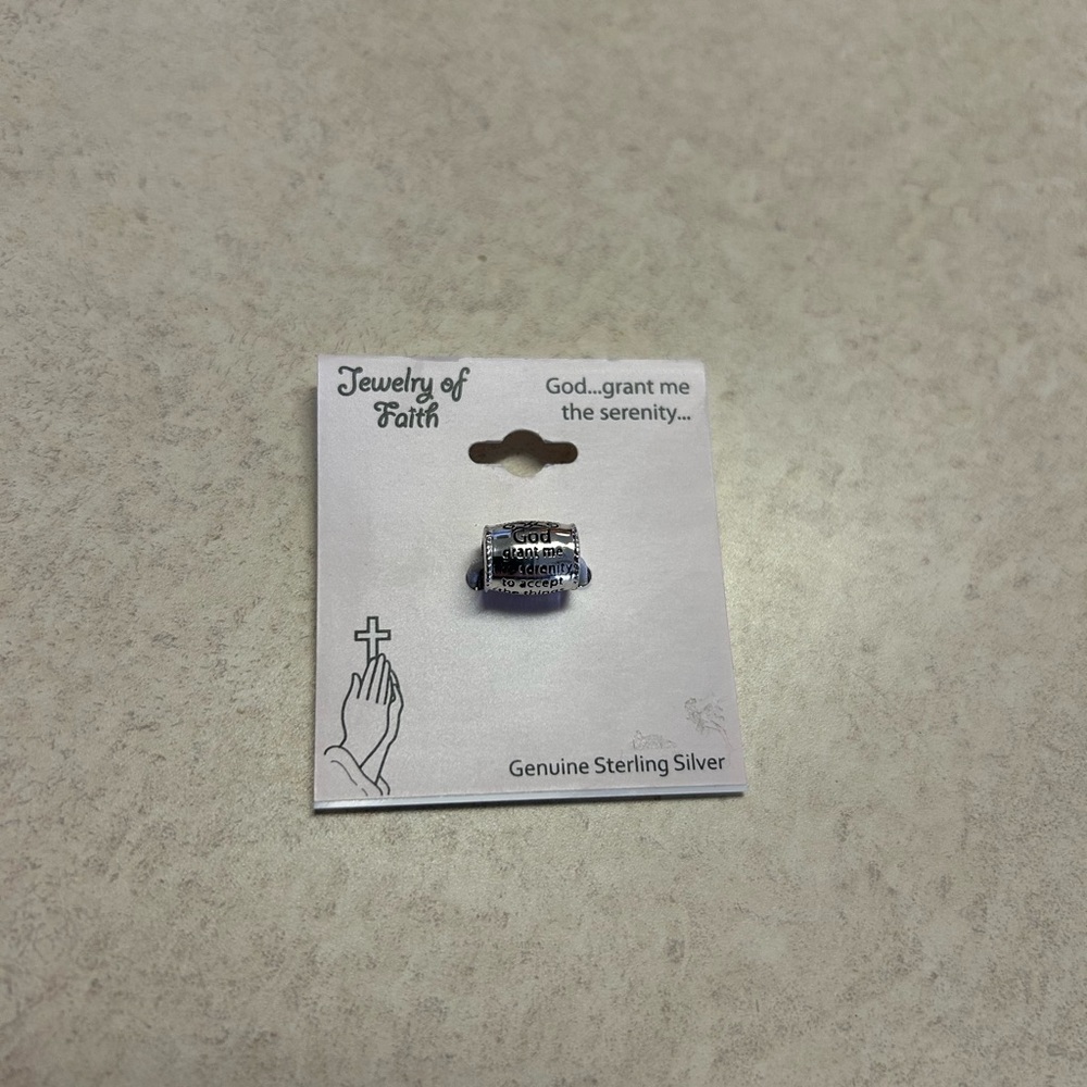 Sterling silver bracelet charm.